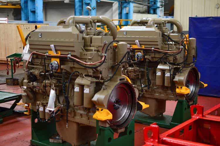 Heavy Duty Diesel Engines CUMMINS for mining trucks on the Industrial conveyor in the workshop of an automobile BELAZ plant