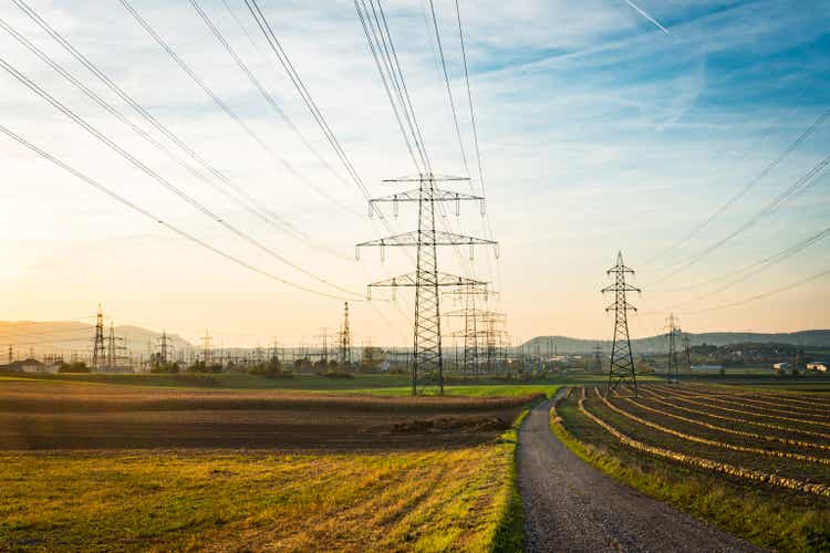 Electric power lines during sunset
