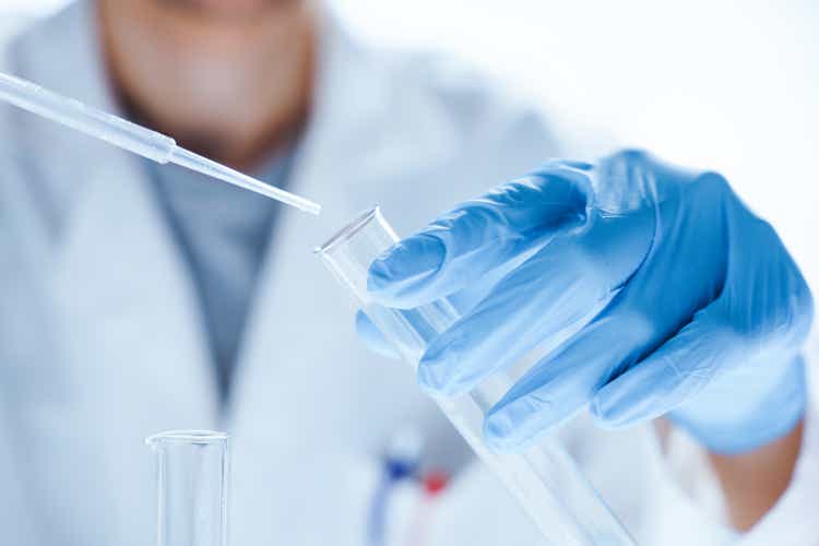 Microbiological research with a test tube and micropipette in close -up