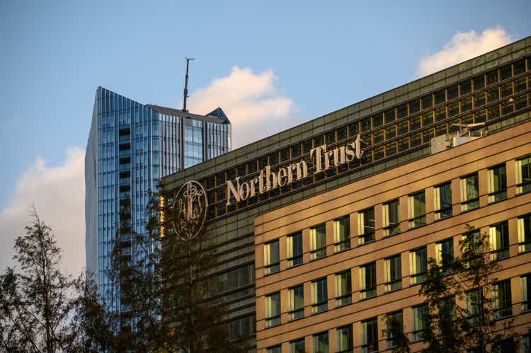 Northern Trust logo at top Canary Wharf building