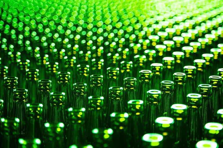 Glass bottle at factory for production of glass containers. Glass bottle texture