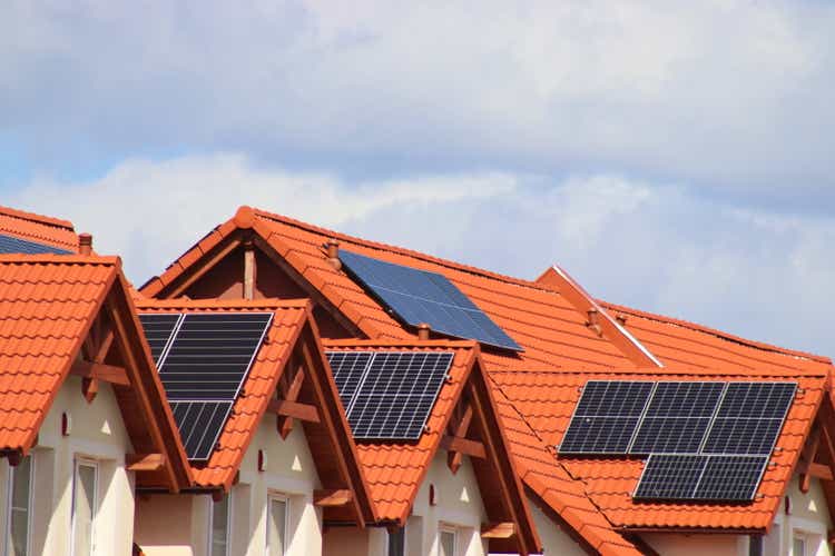 Small photovoltaic panels on a terraced house estate