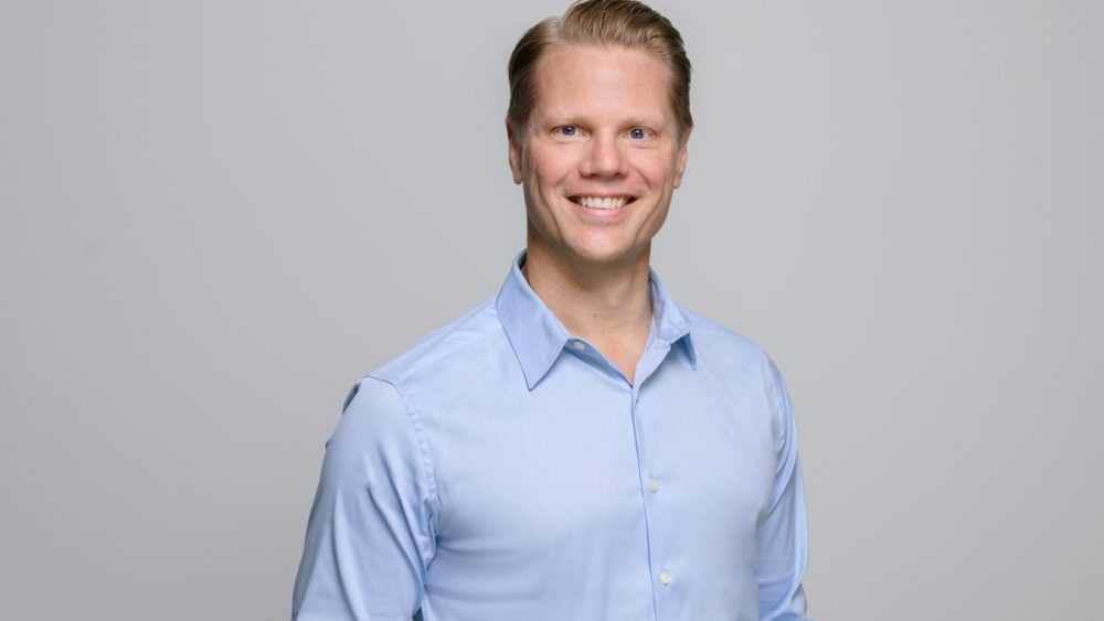A headshot of Kris Elverum, CEO of AIRNA.