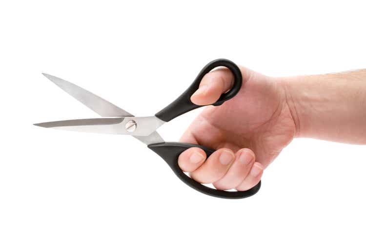 Hand Holding Scissors