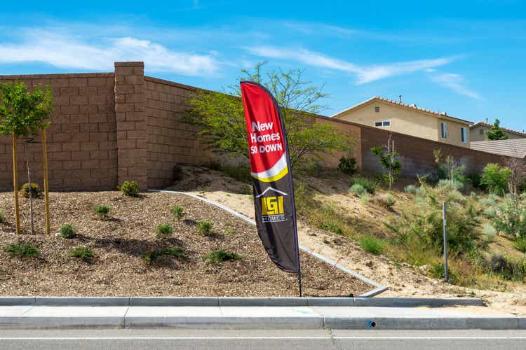 Feather flag sign for LGI Homes with text of New Homes - 0% Down